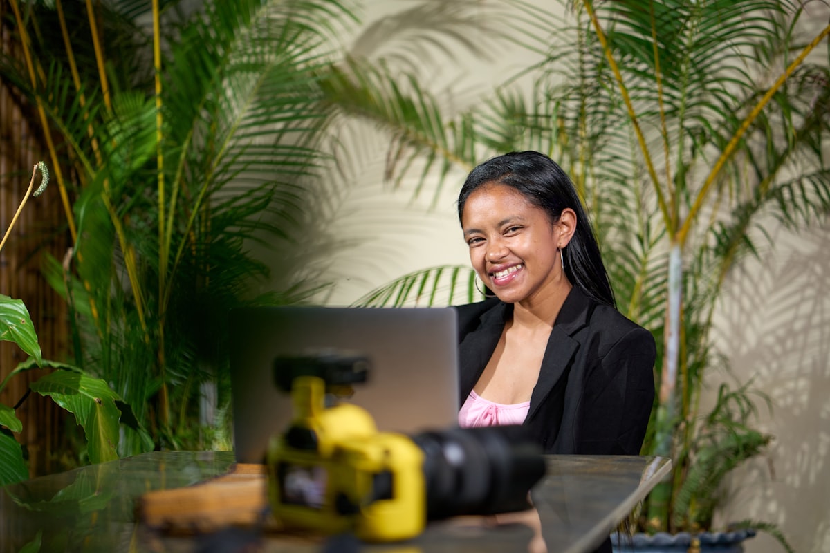 Woman smiling while working at a desk